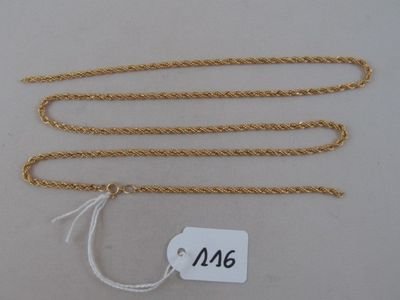 a gold chain with a price tag on it
