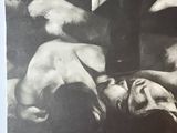 an image of a black and white photo of a man laying on the ground