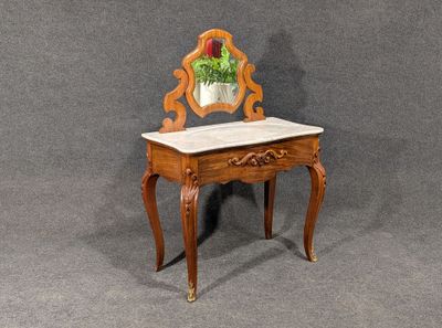 an image of a small wooden table with a mirror on top of it