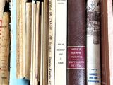 many books that are sitting on a shelf together