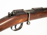 a close up of a rifle on a white background with a white background