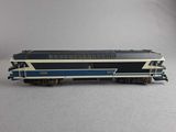 an image of a blue and white train car on a white surface