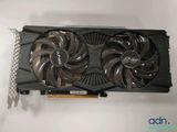 a close up of a video card with a fan on top of it