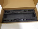 a cardboard box with a piece of equipment inside of it