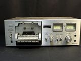 an image of a silver stereo player sitting on top of a table