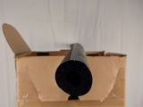 a cardboard box with a face on it and a pipe sticking out of it
