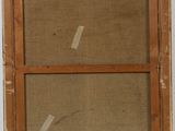 an old wooden window frame with a brown cloth covering the window