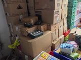 many boxes that are stacked up in a room