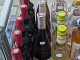 many different types of alcohol bottles on the table