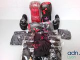 several pairs of boxing gloves, gloves, gloves, gloves, and other items