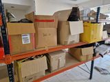 many boxes on the shelves in the room