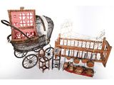 a baby ' s carriage and a doll ' s crib next to each other