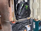 a tool case with tools in it sitting on the floor
