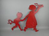a red silhouette of a boy and a girl holding hands