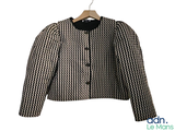 black and white jacket on a hanger on a white background