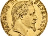 an image of a gold sovereign coin with a man ' s head on it