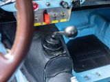 a close up of a steering wheel and dashboard of a car