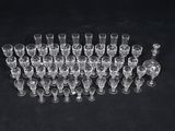 a lot of empty glasses on a black table