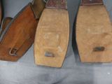 several pairs of shoes are lined up on a table