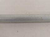 an image of a metal pipe on a white surface