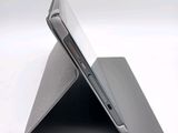 a tablet that is sitting on top of a stand