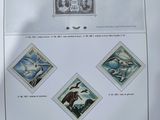an image of a sheet of stamps with a picture of birds