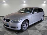 a picture of a silver car parked in a garage