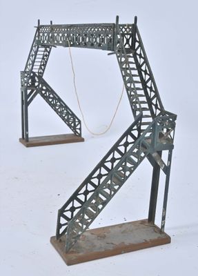 a metal structure that has a ladder on top of it
