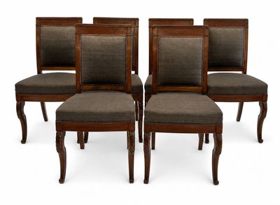 set of four chairs with upholstered upholstered backrests