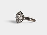 an image of a silver ring with a diamond on it