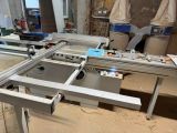 a picture of a table top sawing machine in a workshop