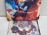a close up of a laptop case with a picture of a dragon on it