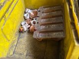 a yellow box with a bunch of bottles inside of it