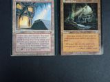 two cards that are sitting on a table