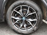 a close up of a tire on a car ' s rim