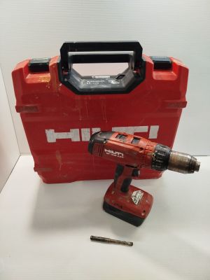 an image of a red tool box with a drill and a screwdriver in it