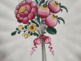 a plate with a bunch of flowers painted on it