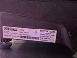 a black box with a label on it sitting on a table