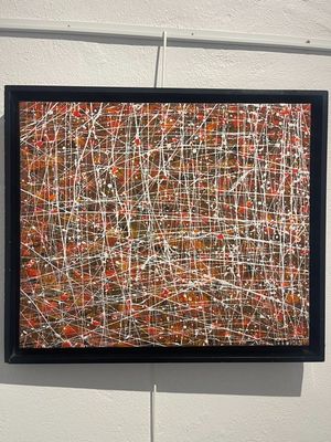 a picture of a painting on the wall hanging on the wall
