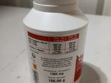a bottle of pills sitting on a table
