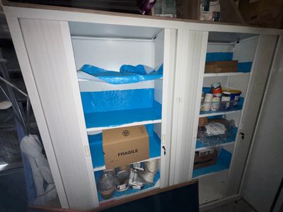an image of a refrigerator with a lot of food inside of it