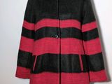 black and red striped coat on a mannequin mannequin mannequin mannequin mannequin mannequin mannequin mannequin mann
