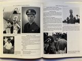 an open book with pictures of men in military uniforms