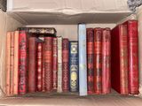 a box full of books that are sitting on top of a table