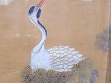 a painting of a crane and giraffe on the wall