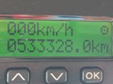 a close up of a calculator with a green display