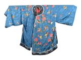 une image représentant une robe chinoise bleue ornée de fleurs