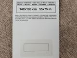 the back of a white card with a barcode on it