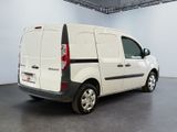 a white van that is parked in a room