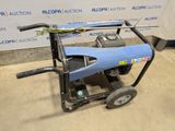 an image of a blue machine sitting on top of a cement floor